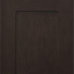 A dark brown cabinet door with no frame.