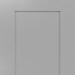 A gray cabinet door with a white frame.